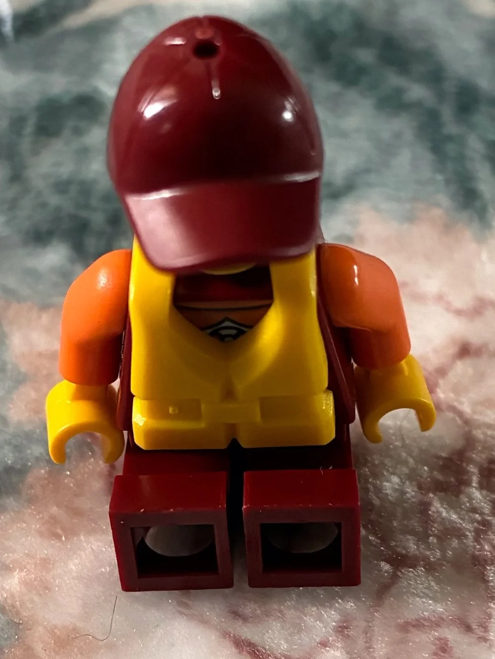 Lego Yellow Life Vest Minifigure with Red Cap and Maroon Legs